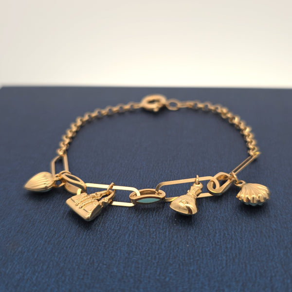 18K bracelet with charms 6.86g